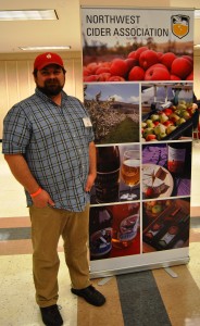 NWCA president David White is pictured with the new banner newly created to promote the association at industry events.