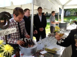 Tyler Phillips of Tieton Cider Works and Schilling Cider's Mark Kornei and Nick Hedgepeth pour for Japanese dignitaries 