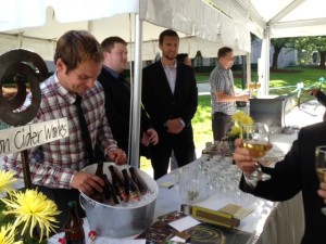 Tyler Phillips of Tieton Cider Works and Schilling Cider's Mark Kornei and Nick Hedgepeth pour for Japanese dignitaries